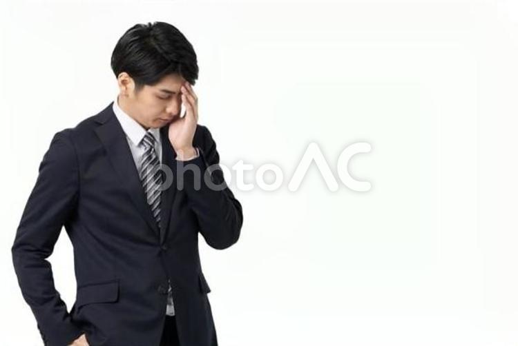失敗して後悔するアジア人ビジネスマン ビジネスマン,男性,失敗の写真素材