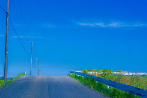 静けさ漂う田舎道 静けさ漂う田舎道 田舎道,青空,電柱の写真素材