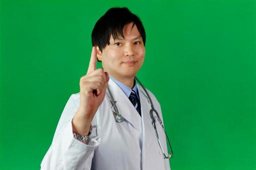 若い医師の指示ポーズ 若い医師の指示ポーズ 医師,男性,若いの写真素材
