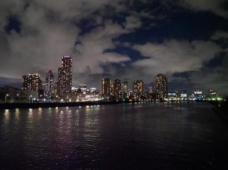 月島&佃の夜景と晴海運河に写る光・東京都 月島&佃の夜景と晴海運河に写る光・東京都 晴海運河,月島,佃の写真素材