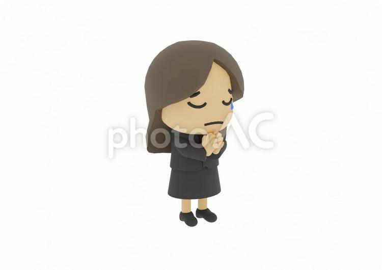 葬式で手を合わせて合掌する喪服の若い女性 合掌,お参り,祈願の写真素材