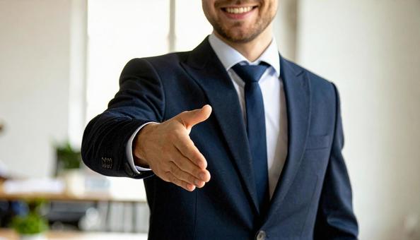 握手を求める外国人男性のビジネスマンの写真