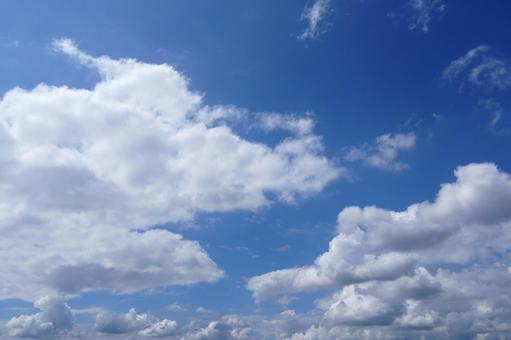 青い空と雲の背景 青い空と雲の背景の写真