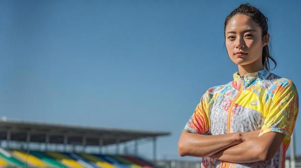 陸上競技を楽しむ若い女性11 陸上競技を楽しむ若い女性11の写真