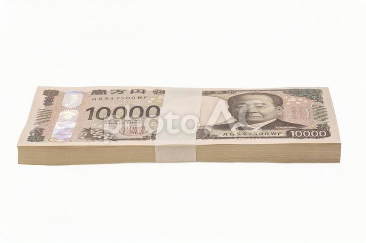 横アングルで撮影した新紙幣の100万円 新紙幣,一万円札,一万円の写真素材