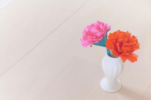 折り紙で作った赤とピンクのカーネーション 折り紙で作った赤とピンクのカーネーションの写真