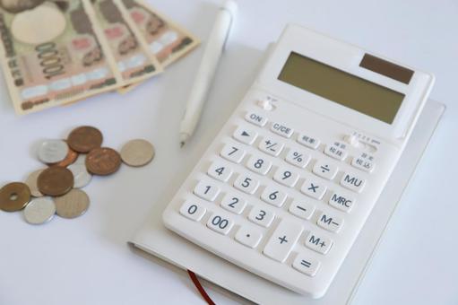 Calculator and money household image, JPG Calculator and money household image, JPG