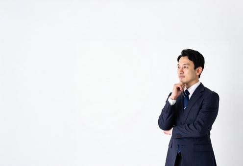 転職を考えるサラリーマンの写真