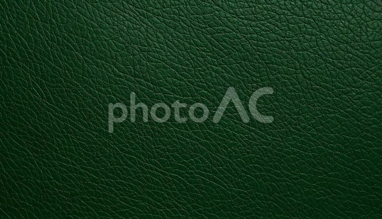 深緑色のリアルな質感のレザーの背景 深緑色,皮,光の写真素材