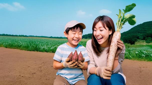 野菜の収穫を楽しむ親子 野菜の収穫を楽しむ親子の写真