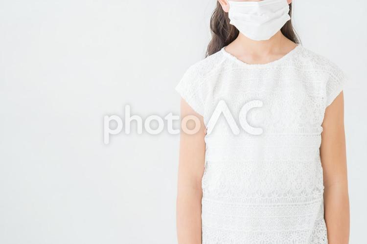 マスクをつけた女の子 子供,マスク,風邪の写真素材
