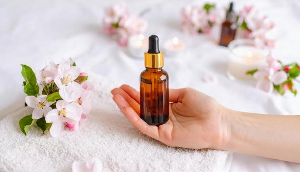 Woman's hand holding aroma oil, aroma, aromatic oil, aromatherapy, JPG