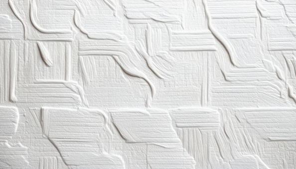 白い凹凸模様が特徴的な壁紙テクスチャ背景 白い凹凸模様が特徴的な壁紙テクスチャ背景の写真