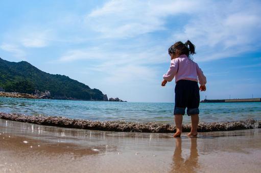 Children playing on the beach, JPG