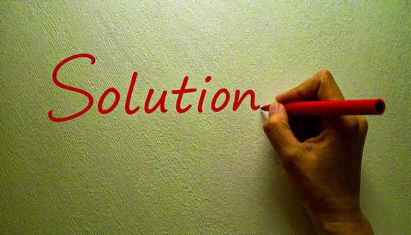 文字「Solution」と赤ペンで書く 文字「Solution」と赤ペンで書くの写真