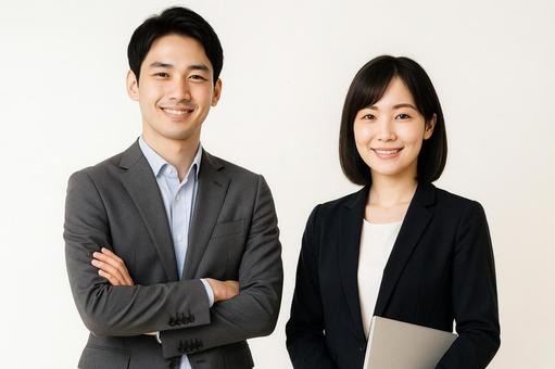 高校教師男女ペアの笑顔 高校教師男女ペアの笑顔の写真