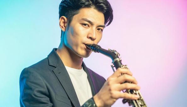 ファゴットを演奏するアジア人男性の写真