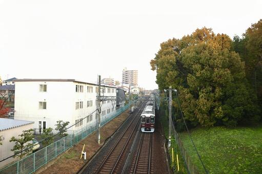 阪急電車が通過する 阪急千里線,大阪梅田行,北千里行の写真素材