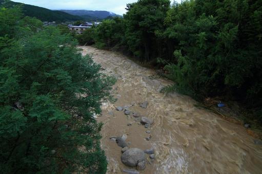Muddy stream after heavy rain Muddy stream after heavy rain