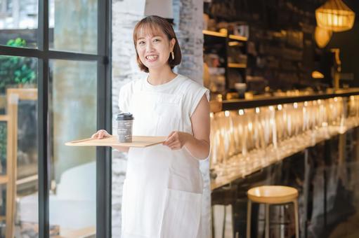 綺麗な店員 綺麗な店員 女性,カフェ店員,笑顔の写真素材