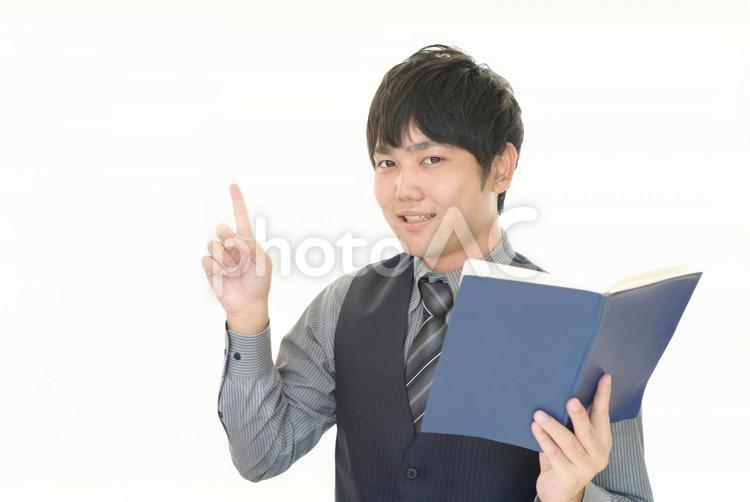 案内する男性 ビジネス,ビジネスマン,男性の写真素材
