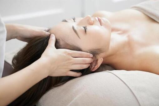 A woman receiving a head massage in a bright beauty salon, JPG A woman receiving a head massage in a bright beauty salon, head massage, female, massage, JPG