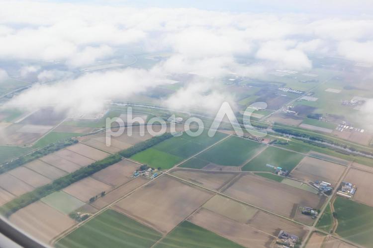 北の大地にやってきた 飛行機,北海道,機窓写真の写真素材