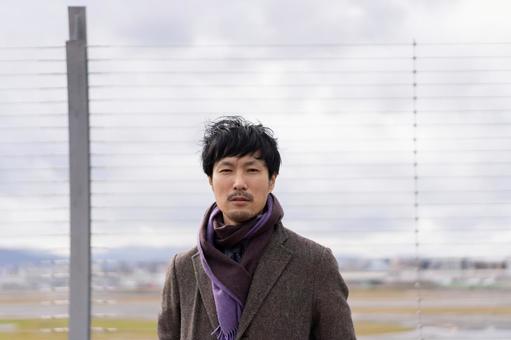 穿冬衣的男士 穿冬衣的男士