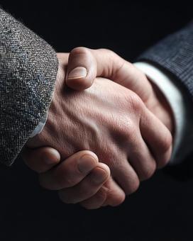 フォーマルな挨拶と握手の写真