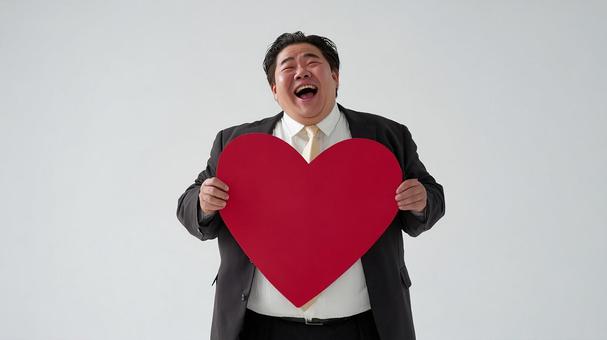 喜びを全身で表現する男性 喜びを全身で表現する男性の写真