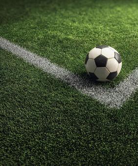 試合開始を待つサッカーボールと白線 試合開始を待つサッカーボールと白線の写真