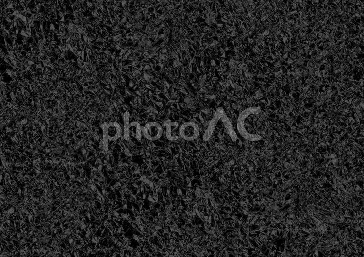 ぼこぼこした黒色の壁のテクスチャ 黒色,黒,模様の写真素材