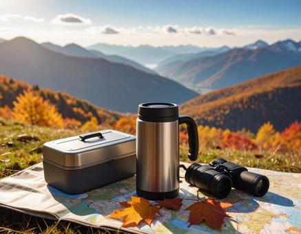 紅葉の山を背景に楽しむ登山の昼休憩 紅葉の山を背景に楽しむ登山の昼休憩の写真