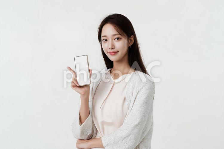 スマホを持つ笑顔の女性 女性,アジア人,若いの写真素材