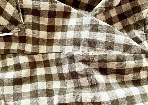 チェック柄の落ち着いた色の布の写真