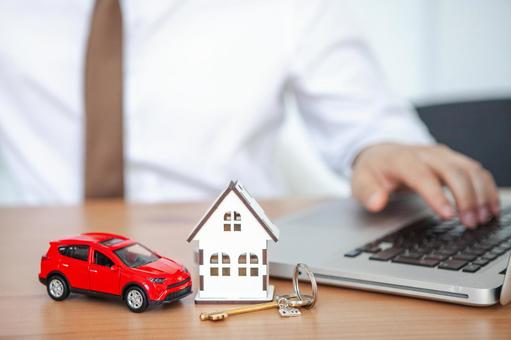 家と車の模型 保険業,事務職,接客業の写真素材