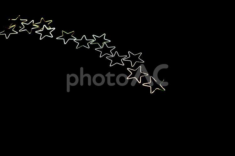 金色の星型　背景素材 黒背景素材,金色,星型の写真素材
