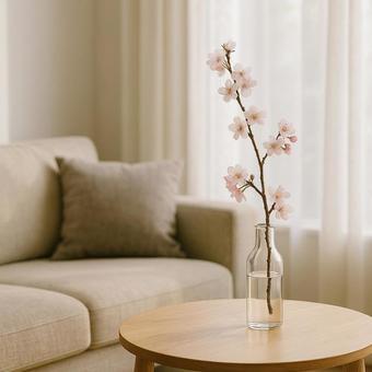 窓辺の桜一輪挿しの写真