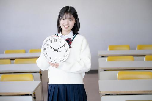 時計と学生 女子高生,制服,生徒の写真素材
