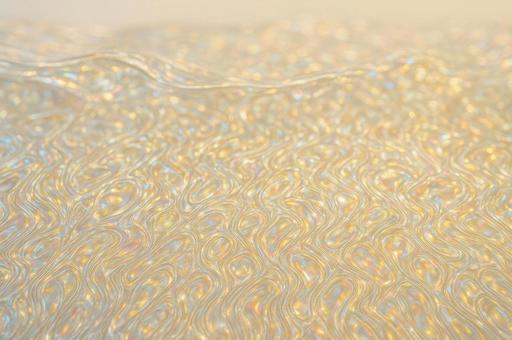 虹色に輝くパール調の抽象模様の写真