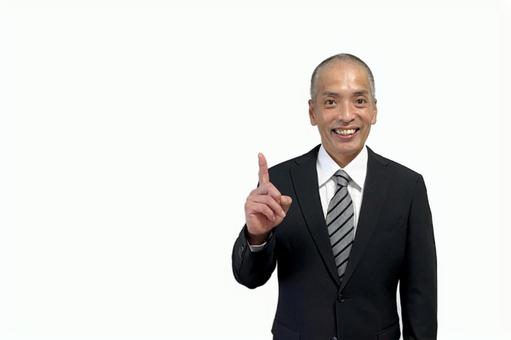 人差し指でオススメするスーツの中年男性 人差し指でオススメするスーツの中年男性 ビジネス,男性,イメージの写真素材