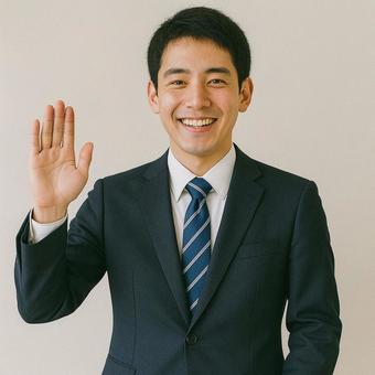 笑顔で挨拶する新入社員ビジネスマンの写真