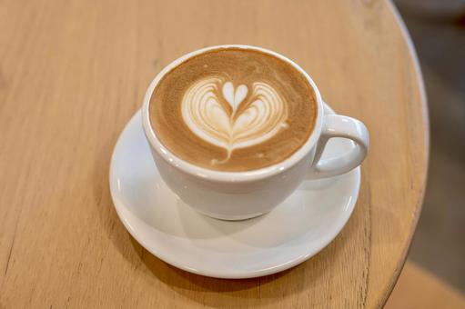 ハートのラテアートが美しいカフェラテ ハートのラテアートが美しいカフェラテ ラテアート,ハート,カフェラテの写真素材