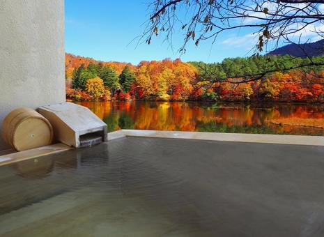 Open-air bath in the autumn leaves Open-air bath in the autumn leaves