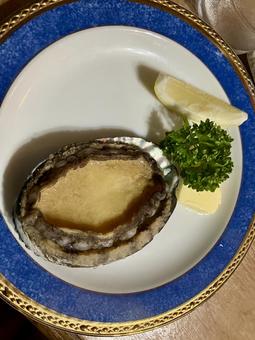 でっかいアワビ 鮑,あわび,バターの写真素材