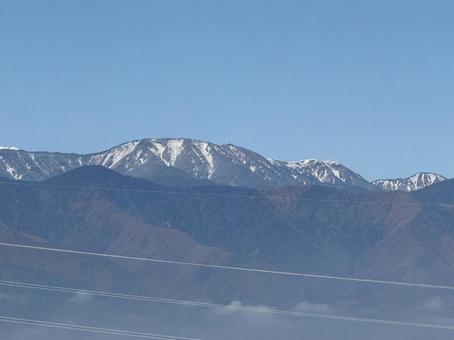 東雲の丘から見た大滝山と蝶ヶ岳 信州,長野県,山の写真素材