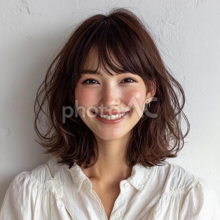 笑顔が可愛い女性 ヘアサロン,ミディアムヘア,外ハネの写真素材