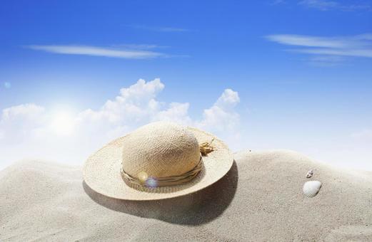 砂浜と麦わら帽子 砂浜と麦わら帽子 麦わら帽子,砂浜,ビーチの写真素材