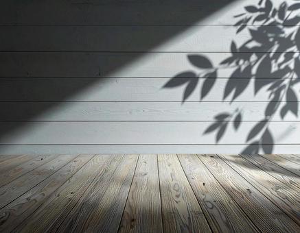 ナチュラルな木目調の壁と植物の影の写真