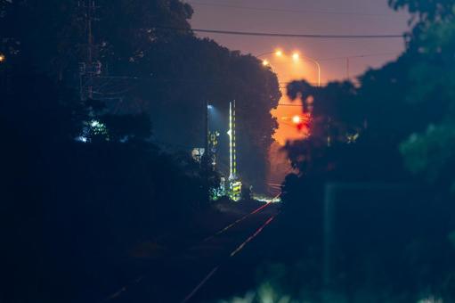 夜の踏切 夜の踏切 踏切,レール,線路の写真素材